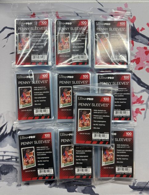 Lotto 10 x 100 di Penny Sleeves | Shield Basic